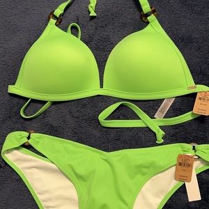 New with tags PINK bikini in neon green with tags. Victoria’s Secret.